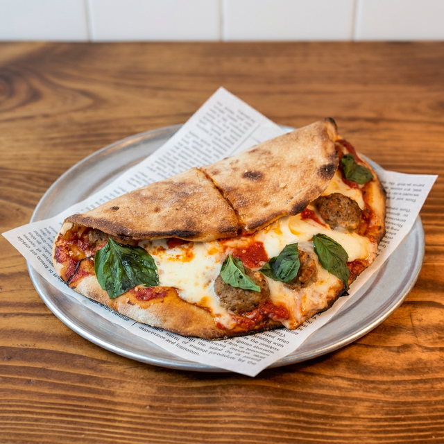 Meatball Parmigiana Pizza Dough Sandwich.
